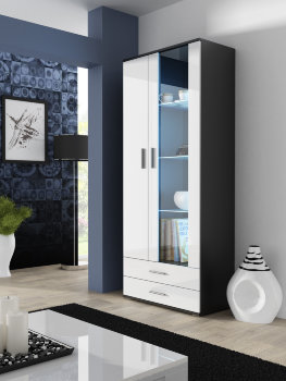 SOHO витрина высокая S6 CAMA Витрина высокая Soho фабрики Cama (Польша) выпускается в цветах:
корпус – белый матовый, фасад – белый глянец;
корпус – белый матовый, фасад – черный глянец;
корпус – дуб сонома, фасад – белый глянец;
корпус – черный матовый, фасад – белый глянец;
корпус – черный матовый, фасад – черный глянец.