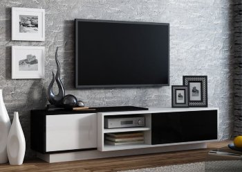 SIGMA 1 тумба ТВ напольная CAMA Тумба ТВ Sigma 1 фабрики Cama Meble (Польша) Выпускается в цветах: 
SIGMA 1A • Корпус - белый мат и черный глянец • Фасады - чёрный и белый глянец
SIGMA 1B • Корпус - чёрный мат и белый глянец • Фасады - белый и чёрный глянец
SIGMA 1C • Корпус - дуб сонома мат и чёрный глянец • Фасады - дуб сонома мат и чёрный глянец
SIGMA 1D • Корпус – дуб сонома мат и белый глянец • Фасады - дуб сонома мат и белый глянец
SIGMA 1E • Корпус – чёрный мат и чёрный глянец • Фасады - чёрный глянец
SIGMA 1F • Корпус – белый мат и белый глянец • Фасады - белый глянец

Размер -  43/180/45